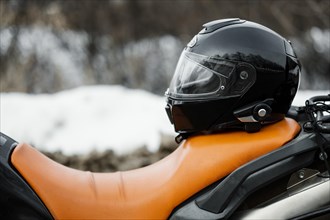Close up motorcycle with helmet