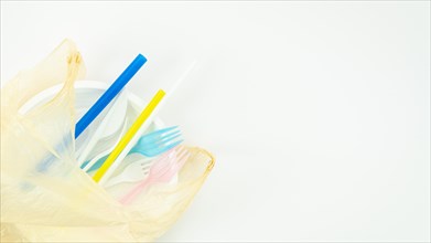 Various colorful plastic disposable tableware