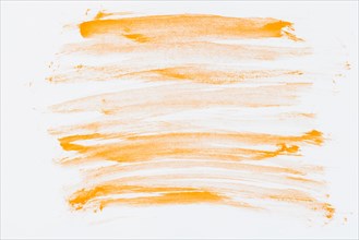 Orange hand drawn watercolor brush stroke