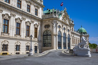 The Austrian flag flies over the upper baroque palace Belvedere