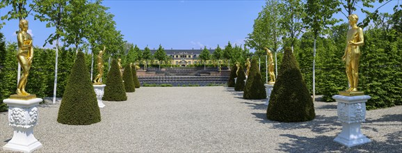 Panoramic photo of golden statues in the Great Garden