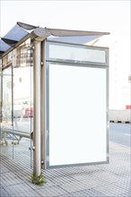 Bus stop with blank billboard
