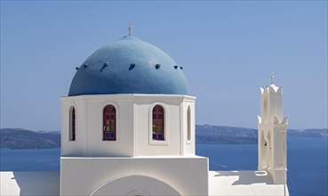 Close-up of blue dome of whitewashed church