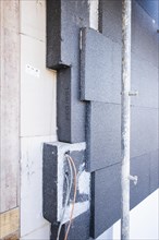 Insulation panels on a house facade of a new building