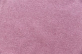 Elevated view pink textile background