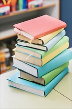 Stack multicolored books table