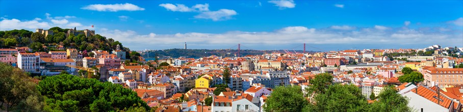 Lisbon famous panorama from Miradouro dos Barros tourist viewpoint over Alfama old district with St George's Castle