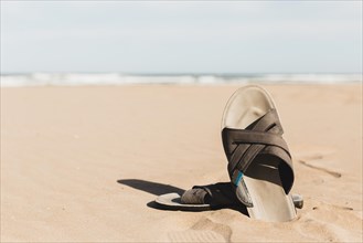 Beach concept with sandal