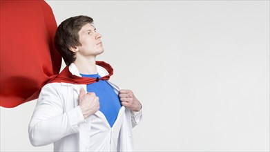 Man with red cape lab coat