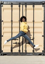 Portrait young woman jumping 1