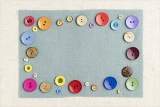 Top view colorful buttons cloth