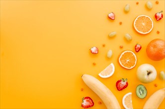 Assorted fruit yellow background