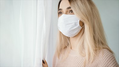 Stay indoors woman wearing white medical mask