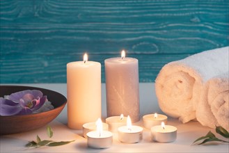 Spa wellness setting with sea salt illuminated candles