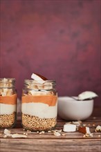 Healthy layered breakfast or dessert with puffed quinoa grains