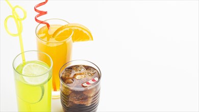 High angle glasses with soft drinks straws