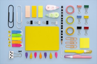 Top view colorful office stationery with paper clips erasers