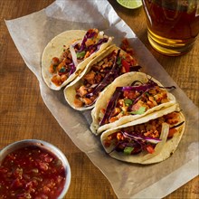 Delicious tacos with sauce arrangement