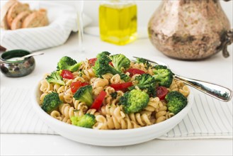 Vegetarian pasta fusilli with tomato broccoli