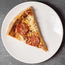 Flat lay slice pepperoni pizza plate