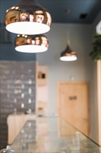 Blur background coffee shop with lighting equipment