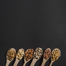 Spoons with various nuts