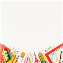 School items white background flat lay