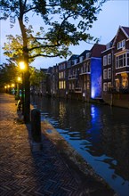Gracht with old houses in the blue hour in Dordrecht