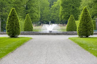 Fountain with shaped trees in the Herrenhaeuser Gardens