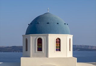 Close-up of blue dome of whitewashed church