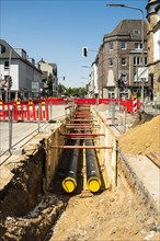 Construction work on a new district heating pipeline for the use of waste heat from an industrial plant in the Benrath district