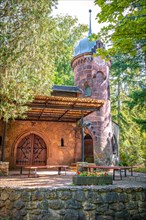 Stone castle in Eisenberg animal park with terrace for events