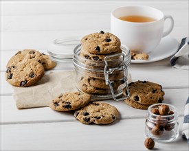 Delicious cookies cup tea table