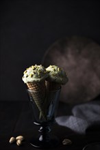 Front view pistachio icecream with nuts