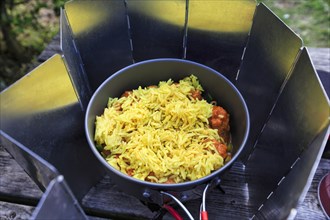 Rice with curcuma in a saucepan