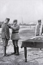 French general Nivelle decorating the Duke of Aosta during a visit to the Italian front Line