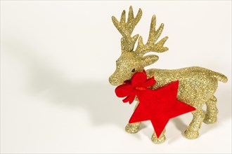Golden reindeer on a white background. Christmas card