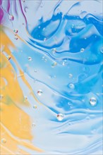 Liquid effect blue yellow painted background