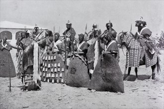 King Rey Bouba celebrating the French Colonel Brisset after the conquest of the country
