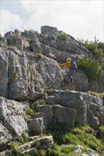 Hiker climbing the Wallberg