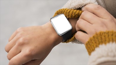 Woman wearing blank smartwatch
