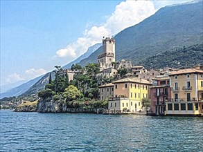 Photo with reduced dynamic range saturation HDR of view of lakeshore of Malcesine at Lake Garda