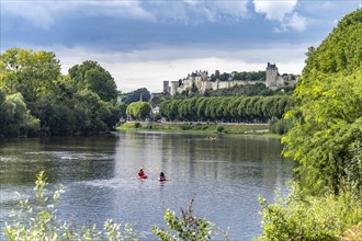Kayaks on the river Vienne in front of Chinon with the castle