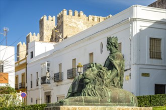 The monument to King Sancho IV El Bravo in front of Guzman Castle in Tarifa