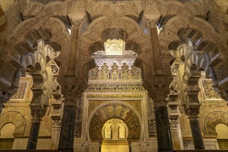 Artfully decorated mihrab in the interior of the Mezquita