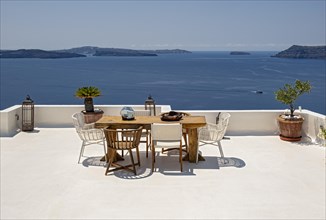 Sea view from terrace with chairs and table