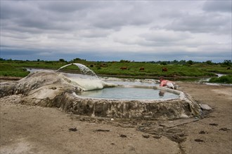 Tourist bathing in springs of Amaghleba