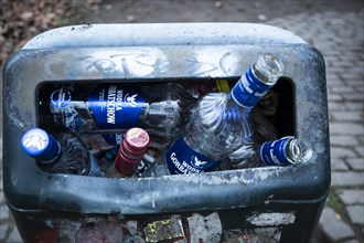 Several vodka bottles in a rubbish bin in Duesseldorf
