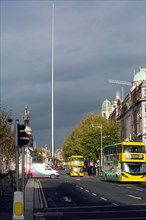 A view of O Connell Bridge and O Connell Street on a bright day with the Spire prominent for all to see. Dublin