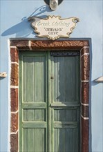 Colourful door in narrow streets of Ia